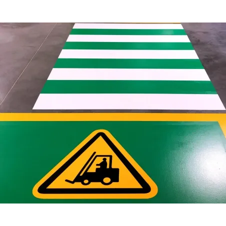 Painting pictograms on the floor together with surface preparation